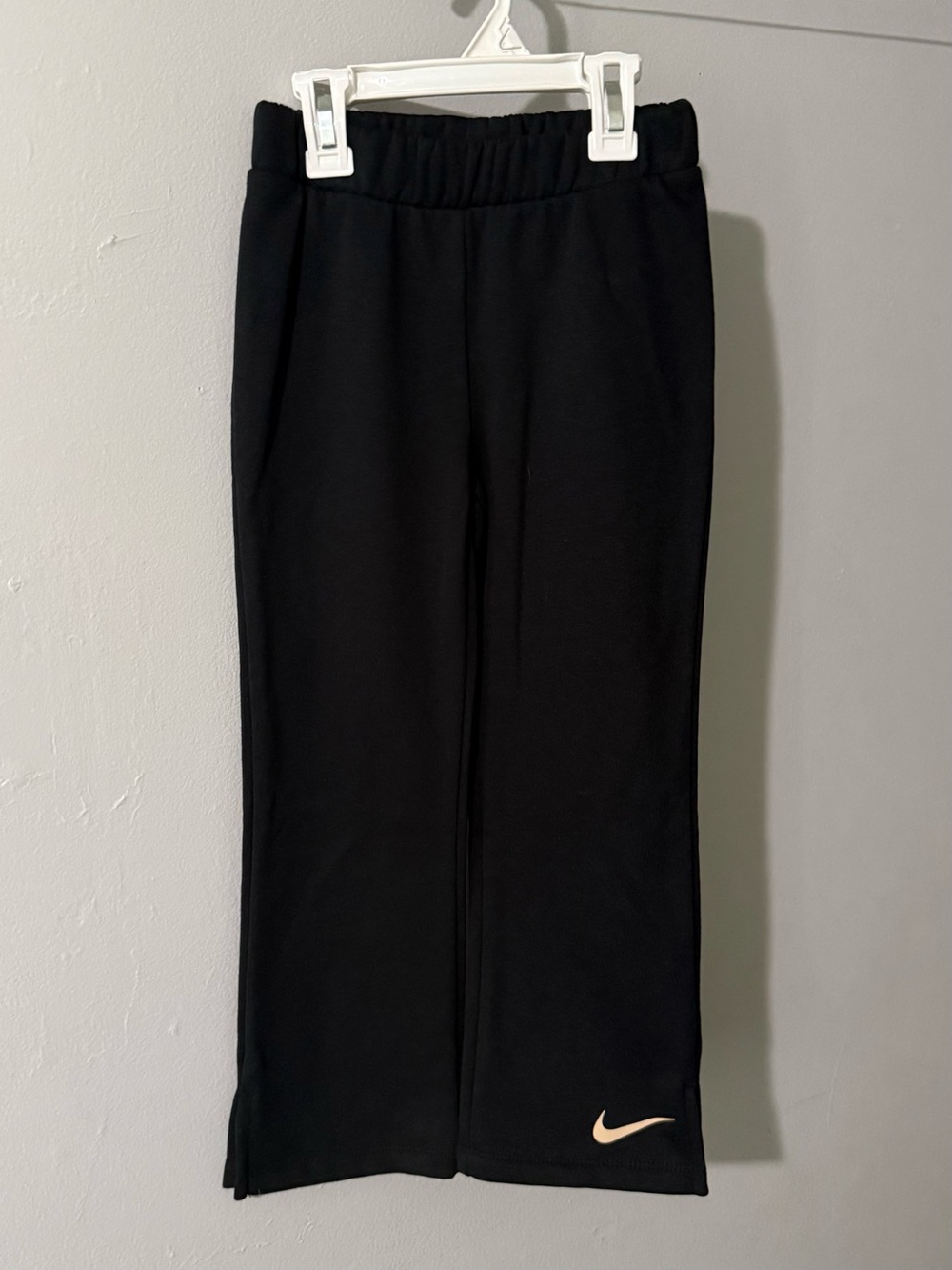 Nike Girl’s Black Flared Sweatpants with Gold Swoosh